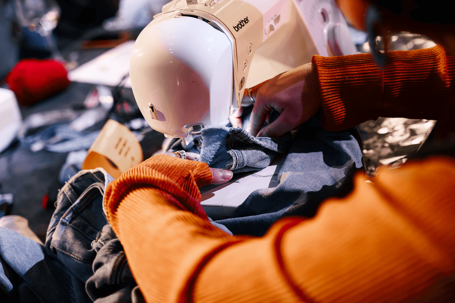 Craftsperson at a sewing machine